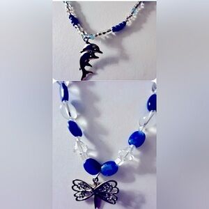 2 NWOT Necklaces 1. Dragonfly 24” 2. Dolphins 22” Silver W Clear & Blue beads